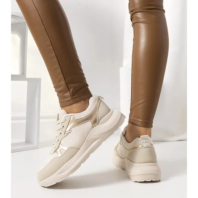 Beige sneakers with golden Davis accents