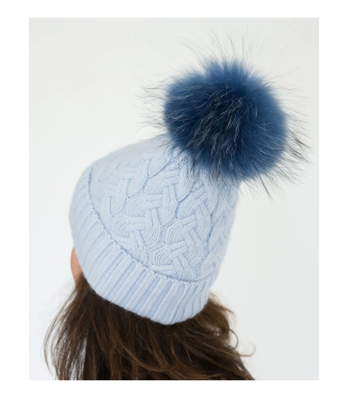 Cassy Knit Beanie with Finn Raccoon Fur Pom Pom in Blue at FurHatWorld.com