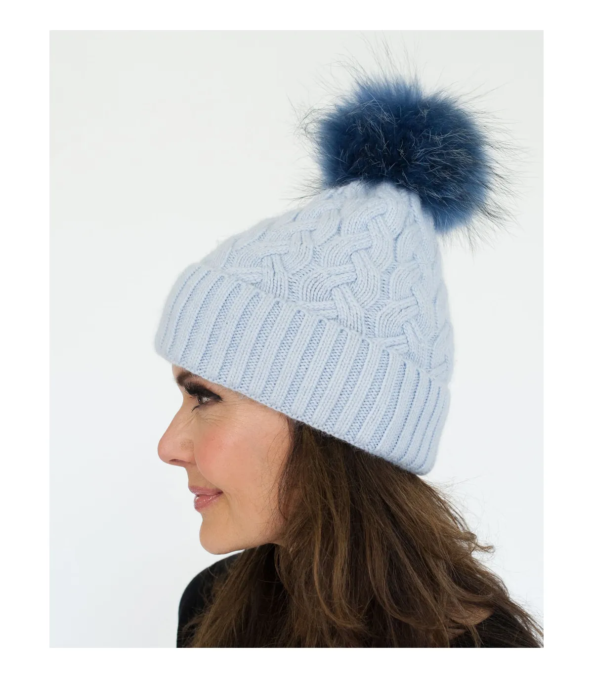 Cassy Knit Beanie with Finn Raccoon Fur Pom Pom in Blue at FurHatWorld.com