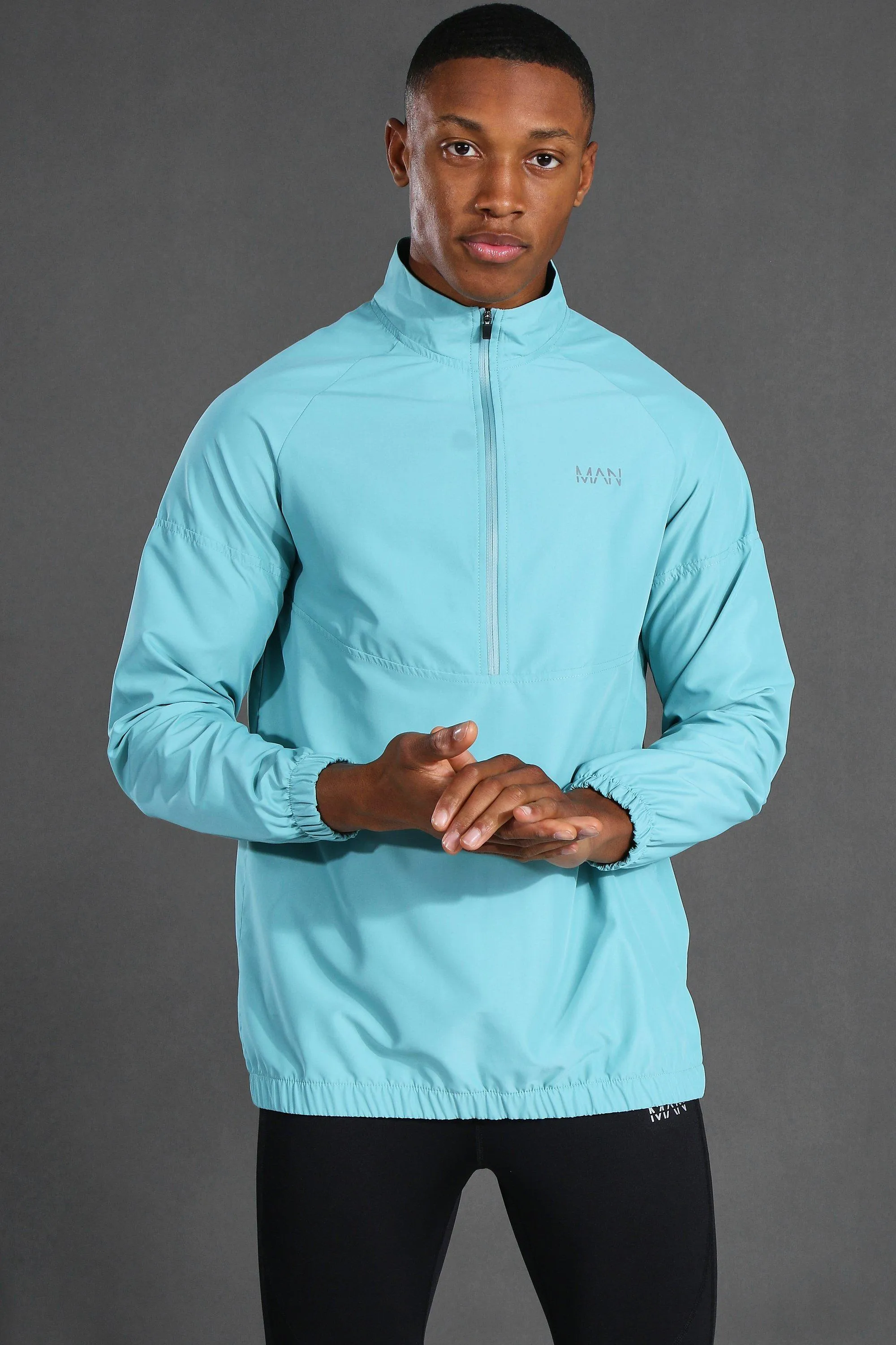 Man Active 1/4 Zip Funnel Neck Windbreaker