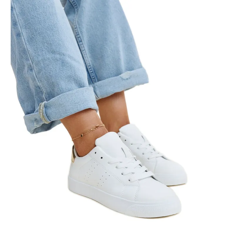 White and gold Akila sneakers