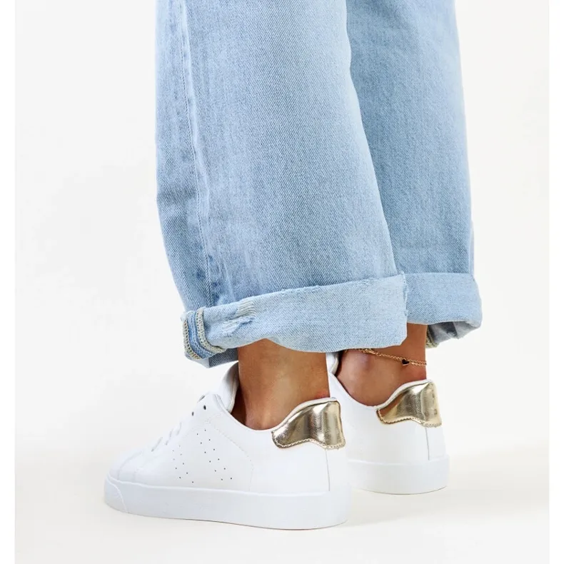 White and gold Akila sneakers